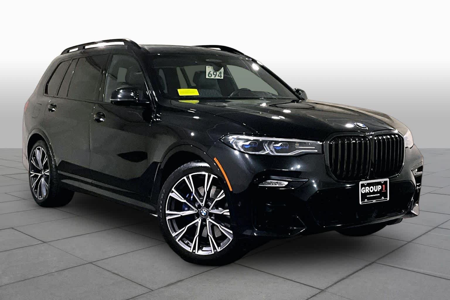 Used 2022 Black Sapphire Metallic BMW M50i image 2