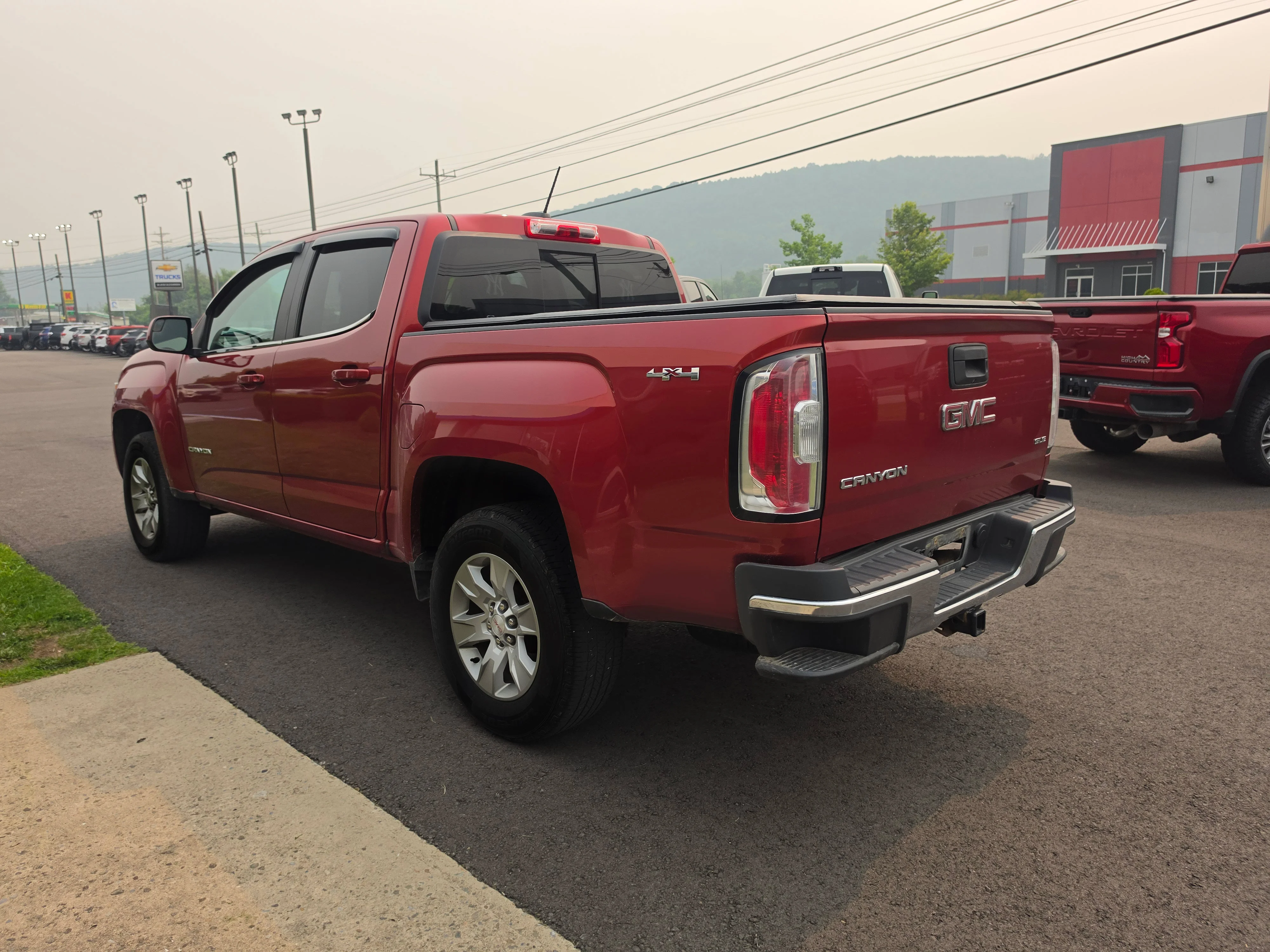 Used 2016 Copper Red Metallic GMC 4WD SLE image 6