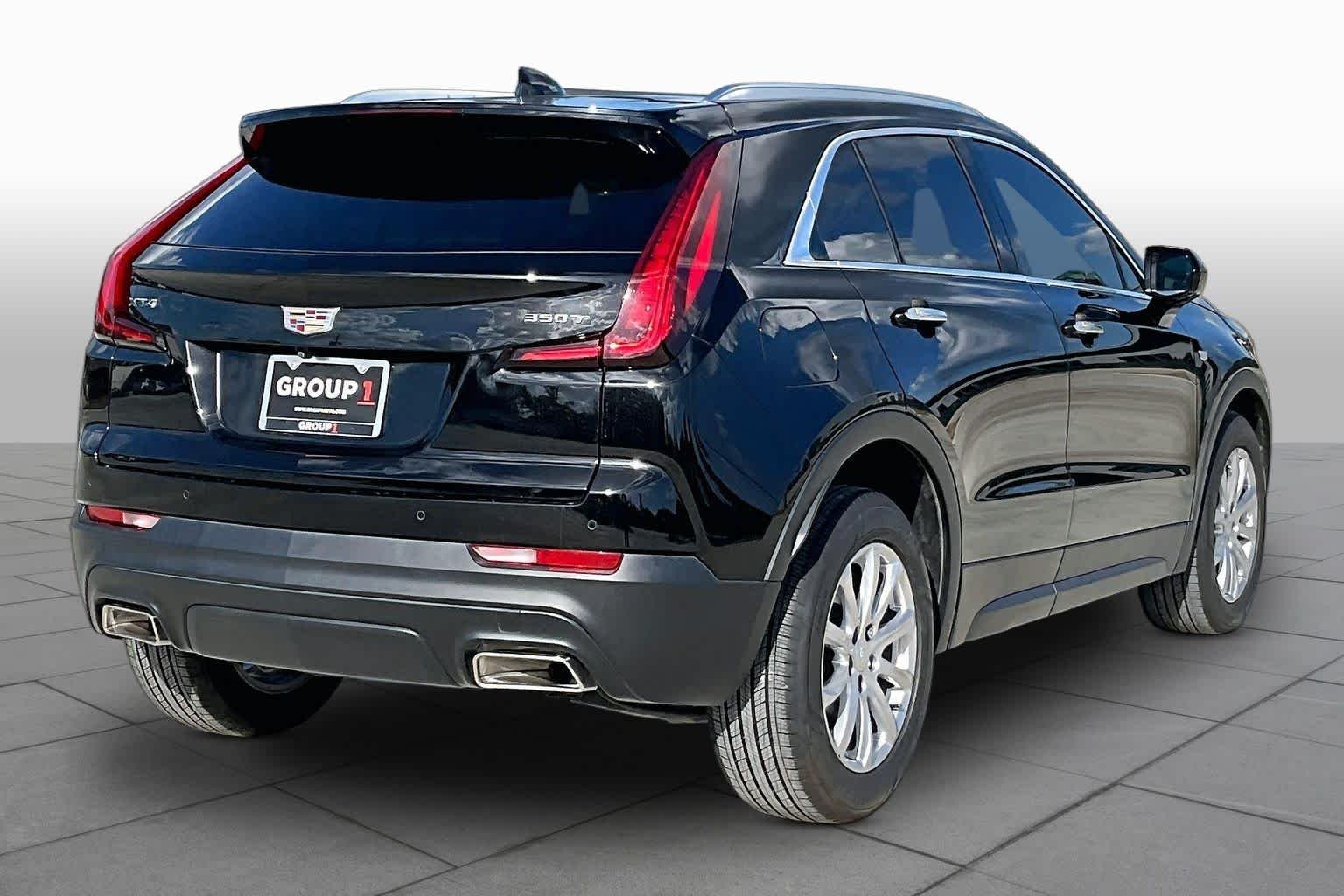 Used 2023 Stellar Black Metallic Cadillac FWD Luxury image 23
