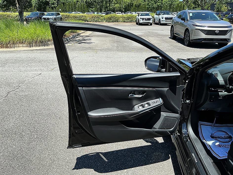 Certified Used 2024 Super Black Nissan SR image 11