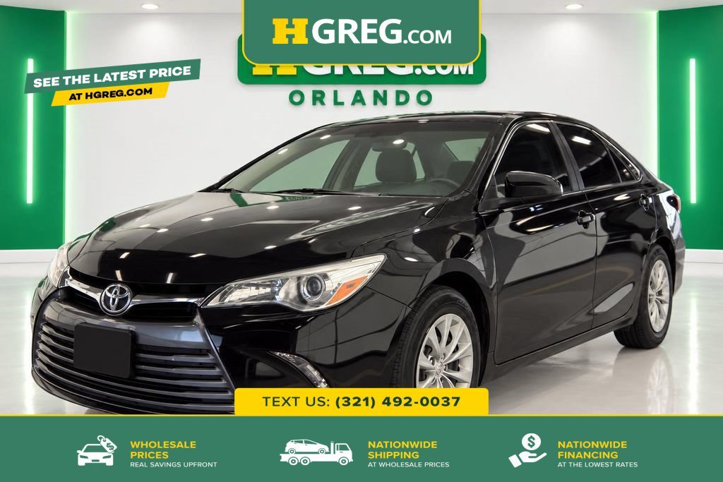 Used 2016 Midnight Black Metallic Toyota LE image 1