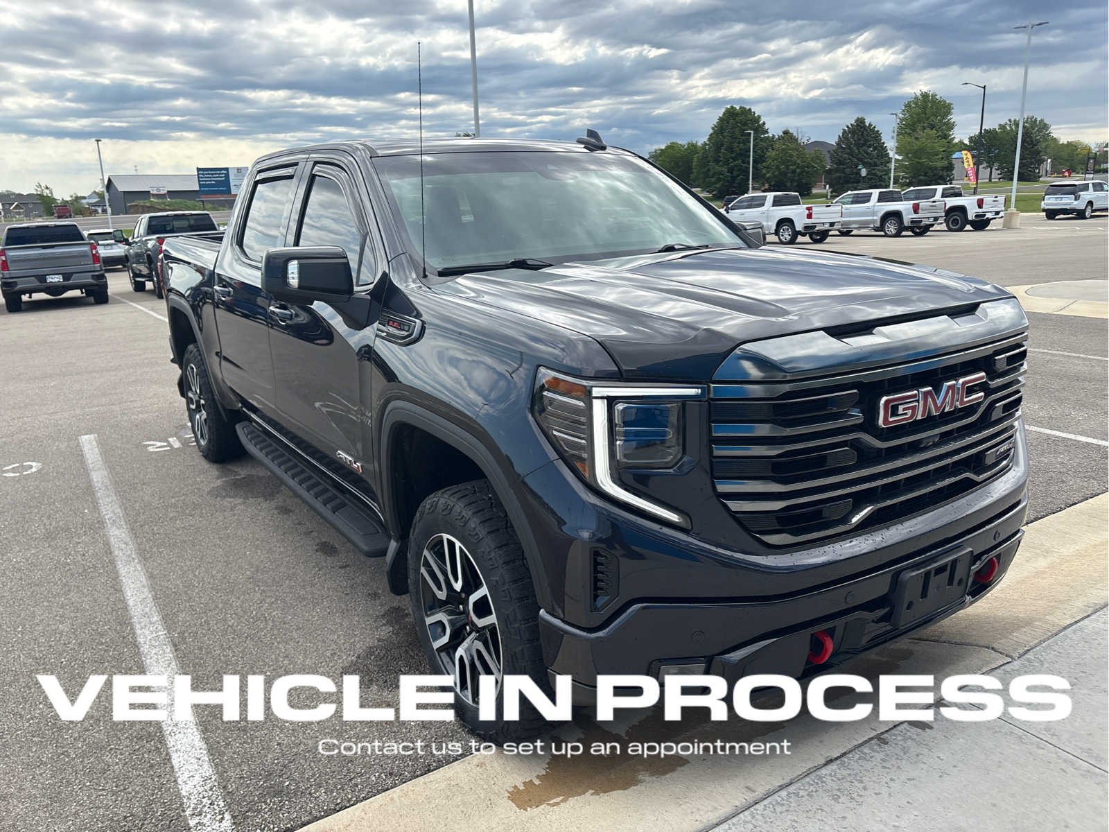 2023 GMC Sierra 4WD Crew Cab Short Box AT4's photo