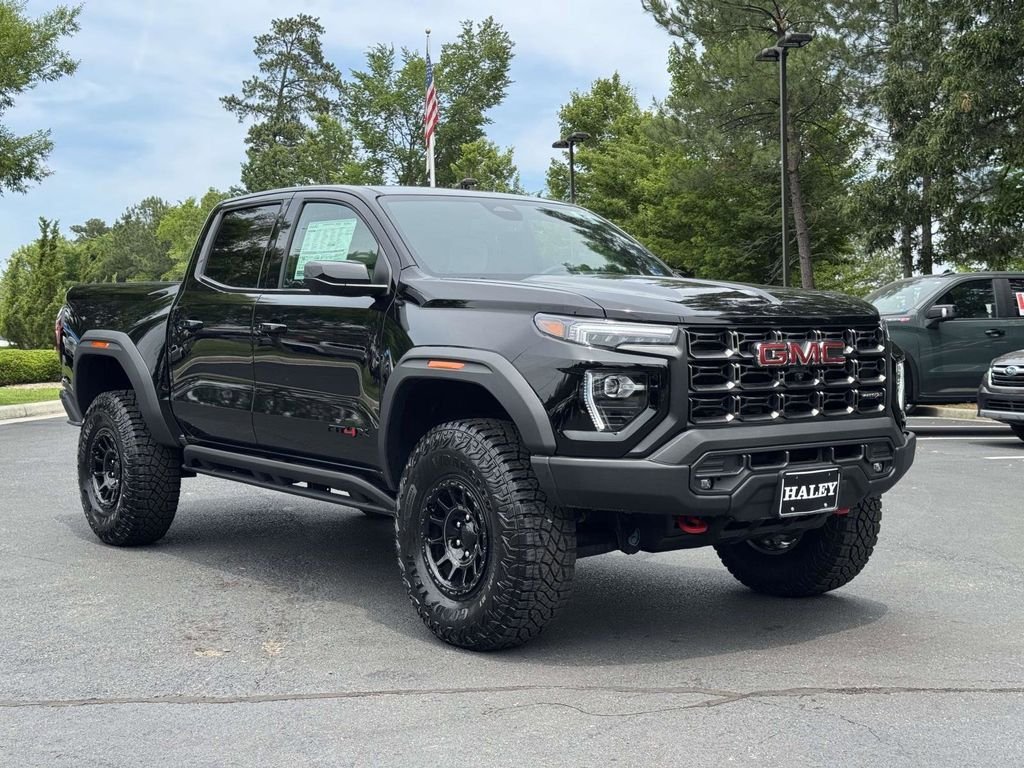 Used 2024 Black GMC AT4X image 2