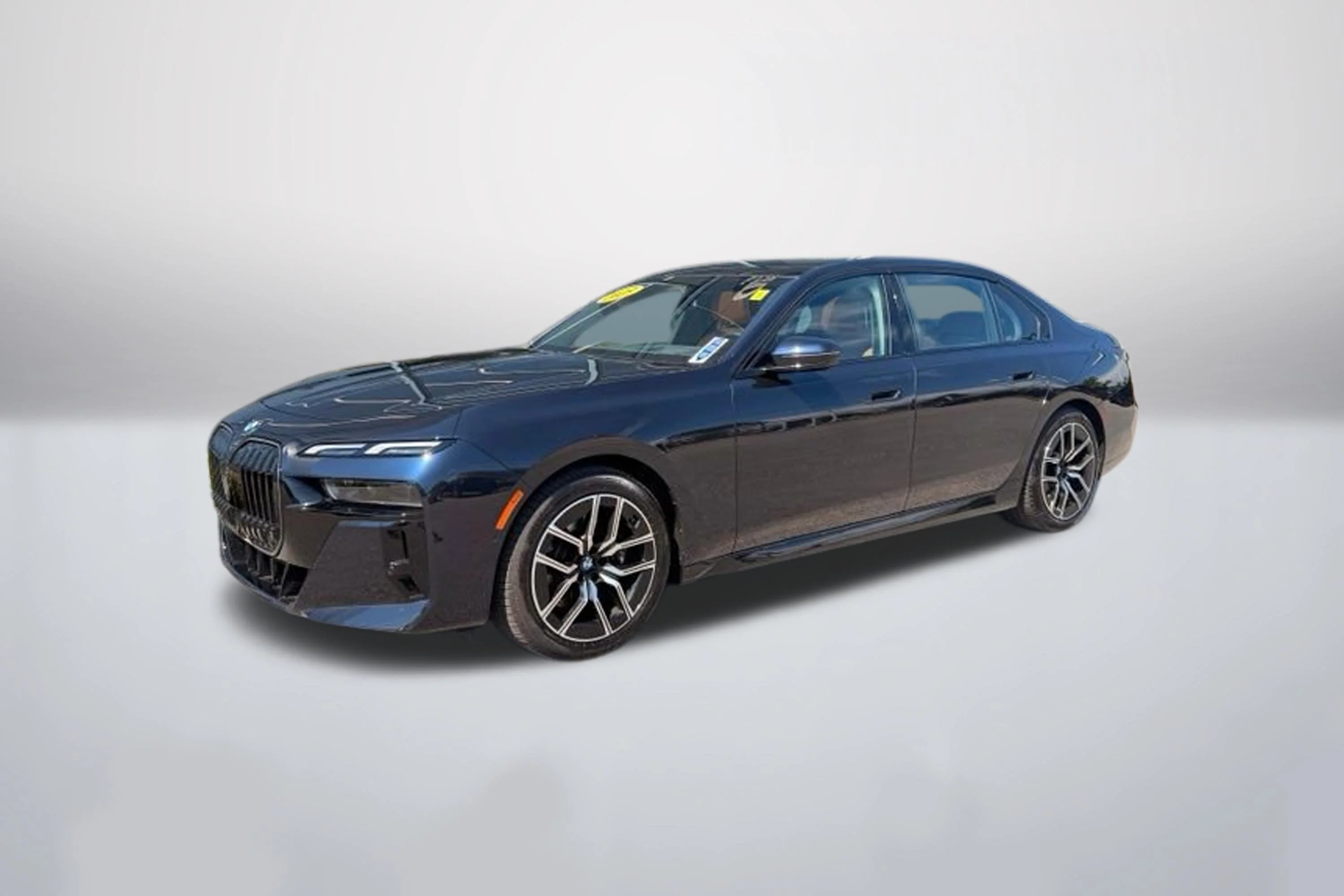 Used 2025 Carbon Black Metallic BMW 740i xDrive image 1