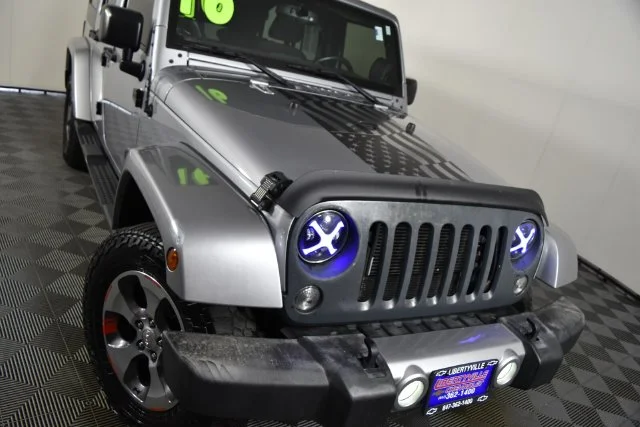 Used 2016 Silver Jeep Unlimited Sahara image 4