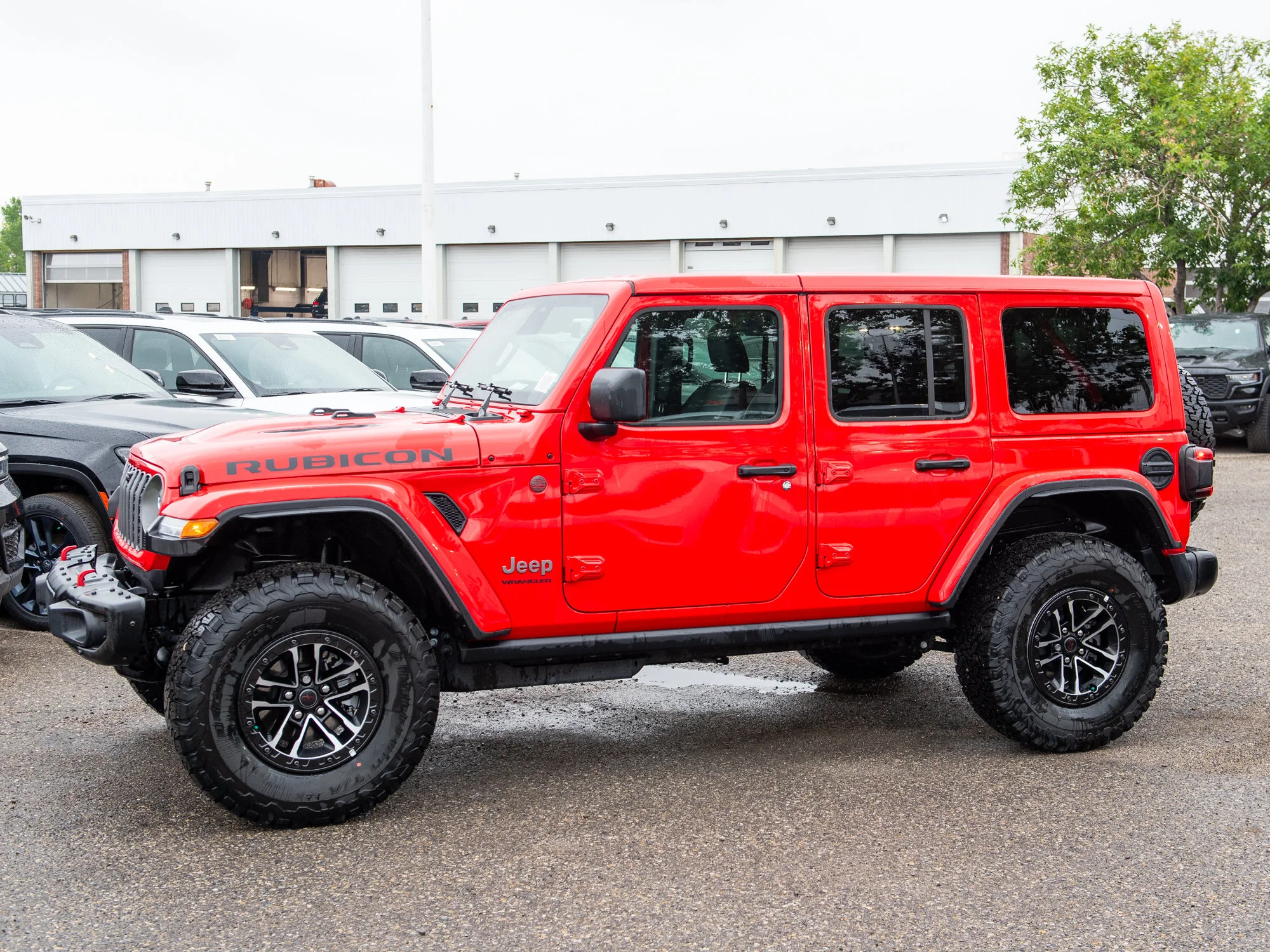 New 2026 Red Jeep Rubicon X*, 35 Inch Tires, Steel Bumpers, Nappa Leather image 4