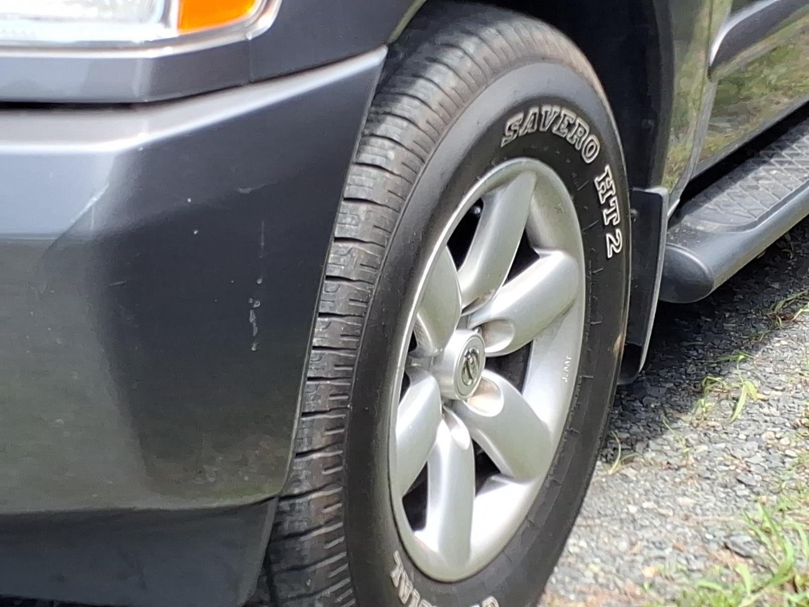 Used 2014 Gun Metallic Nissan SV image 2