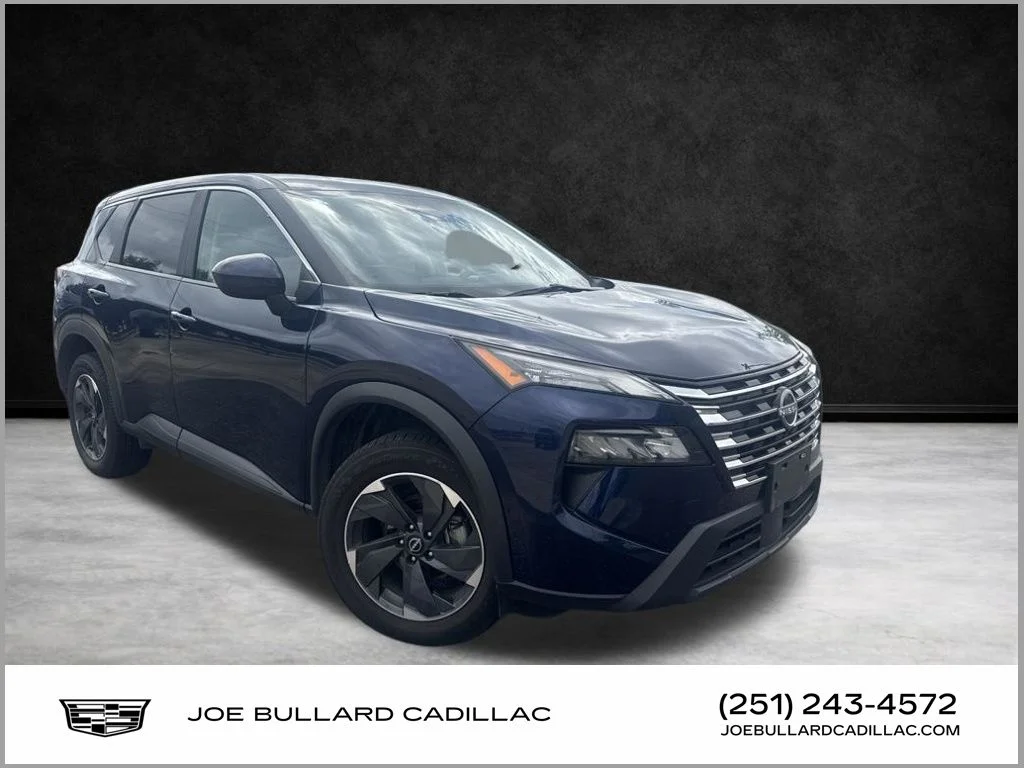 Used 2024 Deep Ocean Blue Pearl Nissan SV image 1