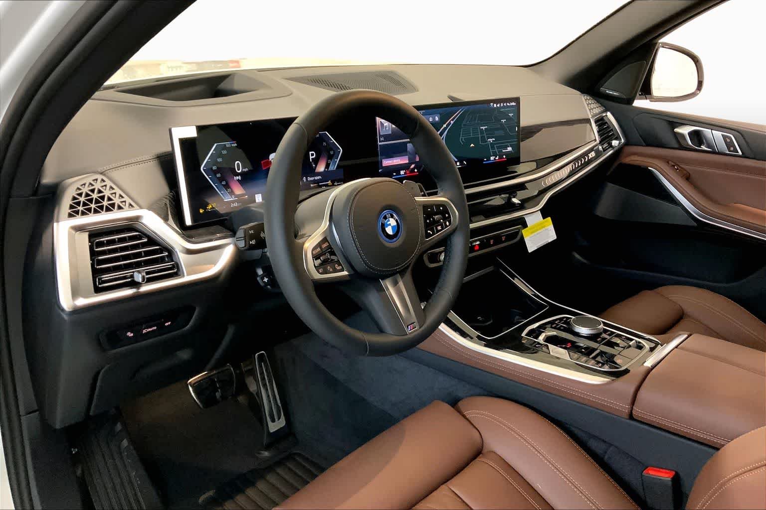 Used 2026 Mineral White Metallic BMW xDrive50e image 8