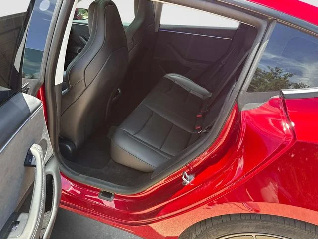 Used 2025 Ultra Red Tesla Performance image 17