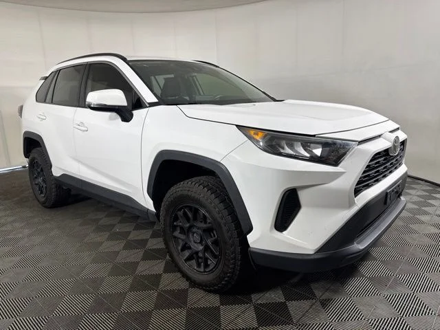 Used 2019 Super White Toyota LE image 1