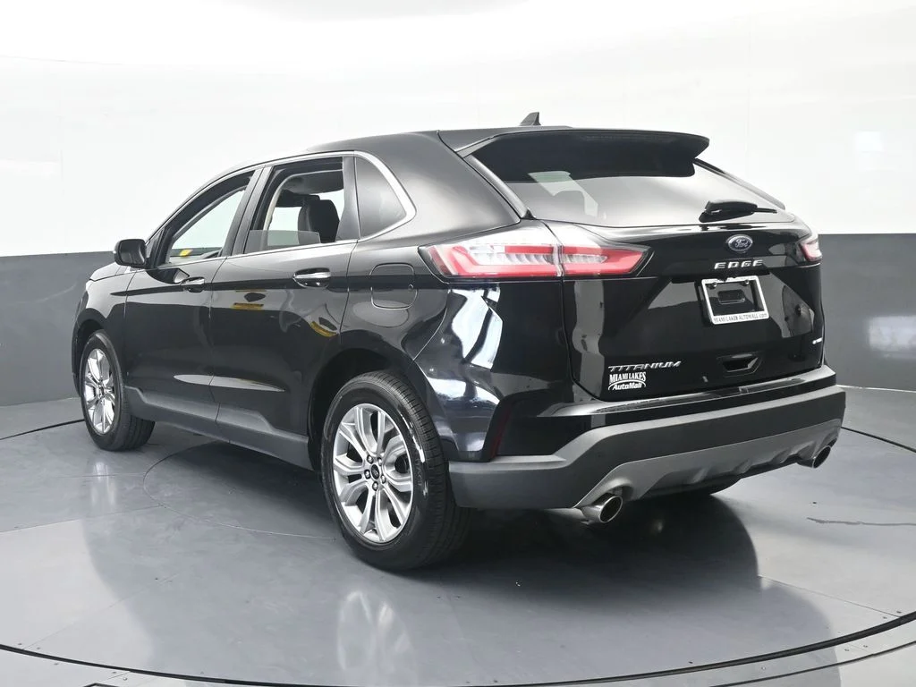 Used 2024 Black Metallic Ford Titanium image 4