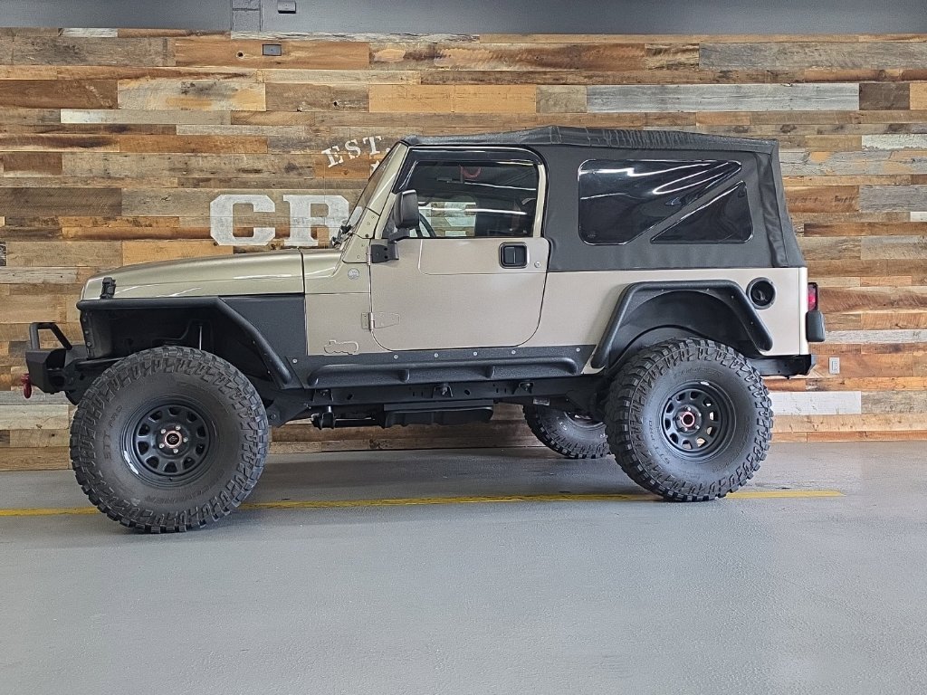 Used 2004 Light Khaki Metallic Jeep Unlimited image 16