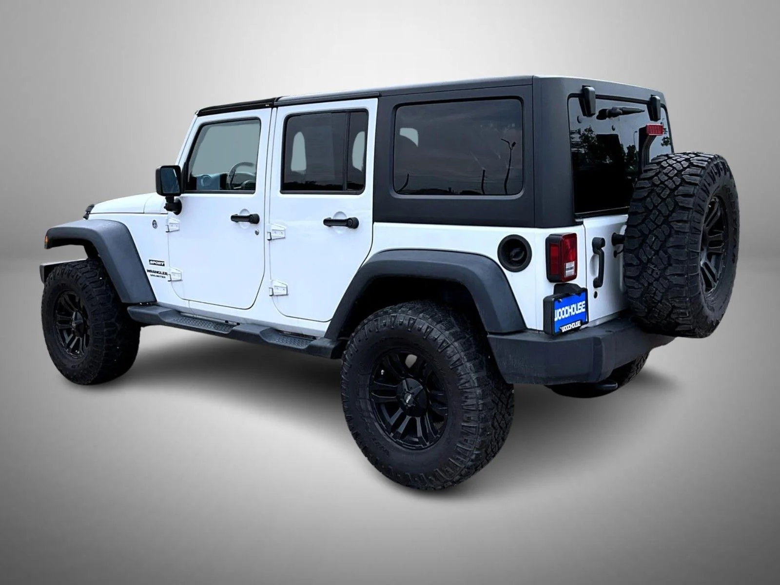 Used 2013 White Jeep Unlimited Sport image 7