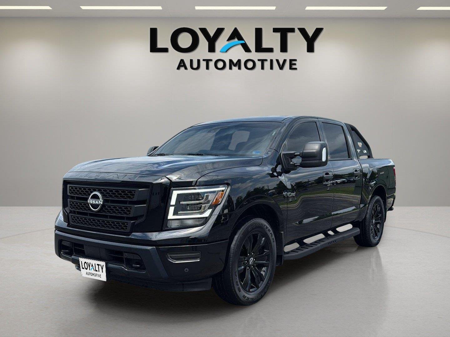 Used 2023 Super Black Nissan SV image 1
