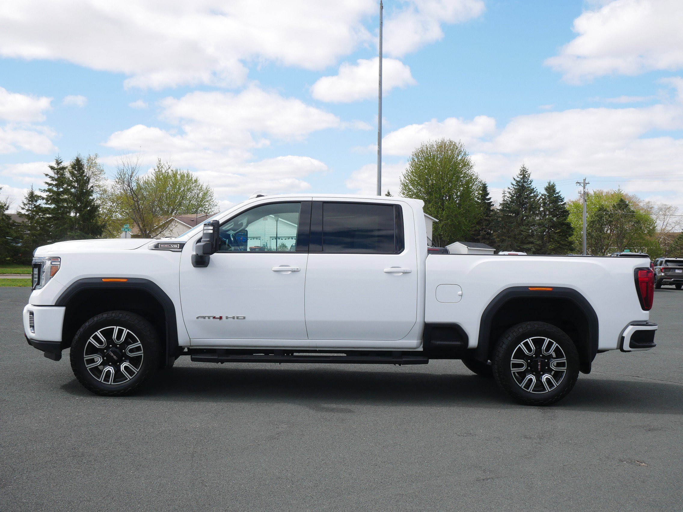Used 2021 GMC Sierra 2500HD AT4 with VIN 1GT49PE71MF302955 for sale in Hastings, Minnesota