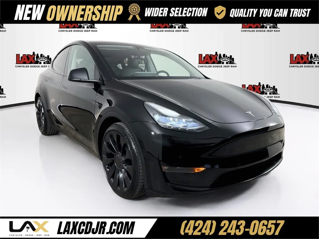 Used 2022 Black Tesla Performance image 1