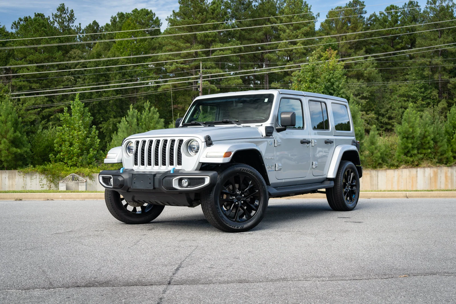 Used 2023 Silver Jeep Sahara 4xe image 1