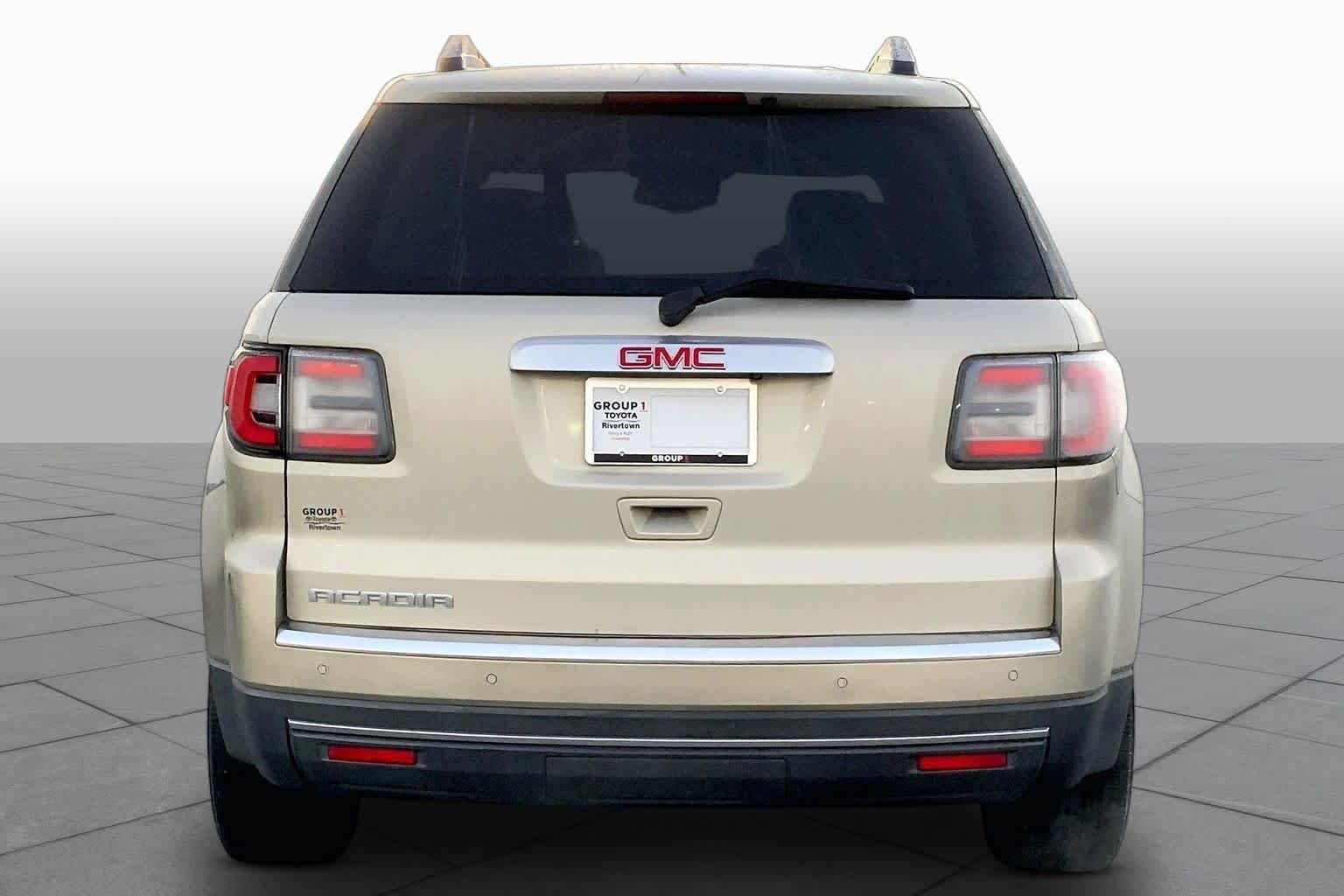 Used 2014 Champagne Silver Metallic GMC SLT image 4