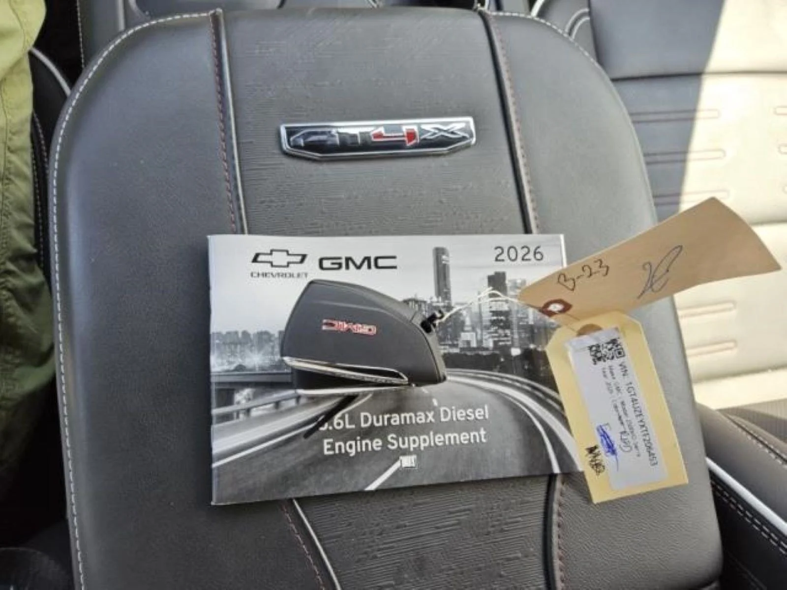 Used 2026 Volcanic Red Tintcoat GMC AT4X image 16