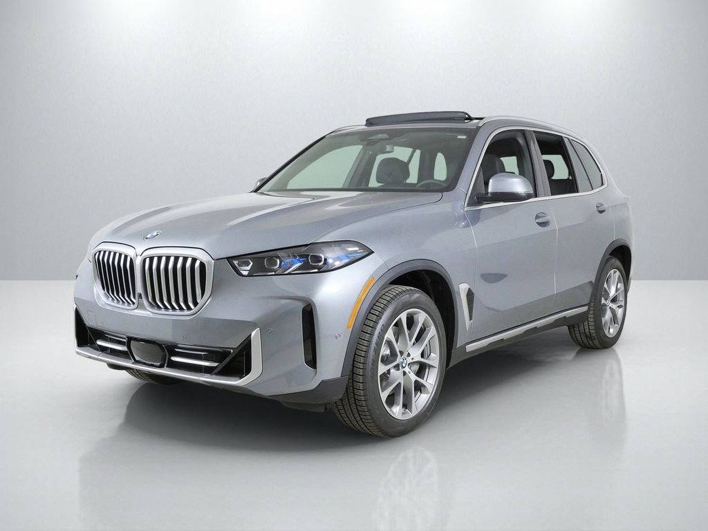 Used 2026 Skyscraper Grey Metallic BMW xDrive40i image 1
