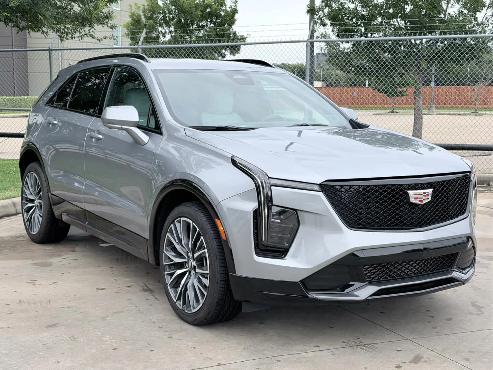 Used 2024 Argent Silver Metallic Cadillac Sport image 3