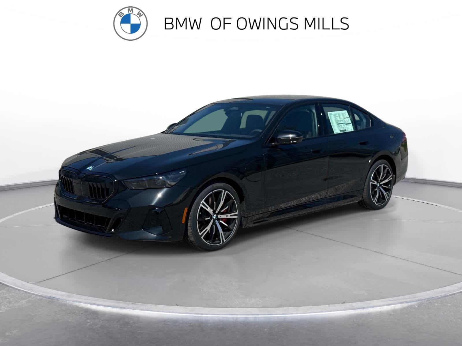 2026 BMW 5 Series 550e xDrive Sedan's photo