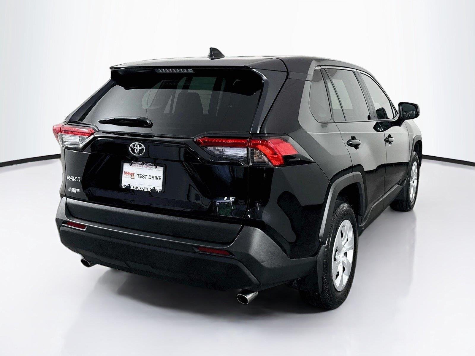 Certified Used 2025 Midnight Black Metallic Toyota LE image 2