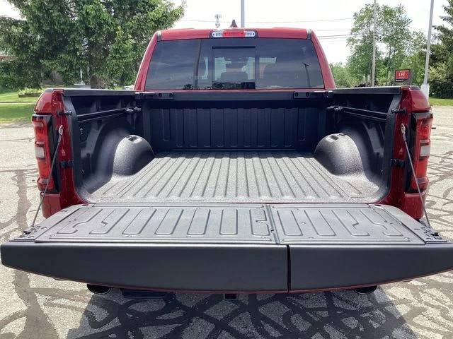 New 2026 Molten Red Ram REBEL CREW CAB 4X4 5