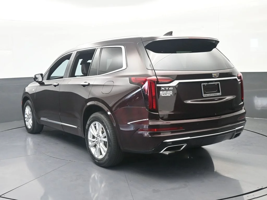 Used 2021 Garnet Metallic Cadillac Luxury image 4