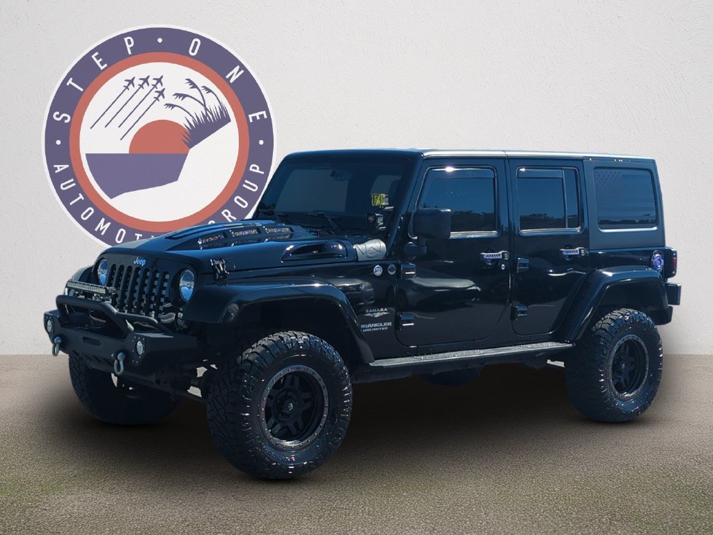 Used 2015 Black Jeep Unlimited Sahara image 2