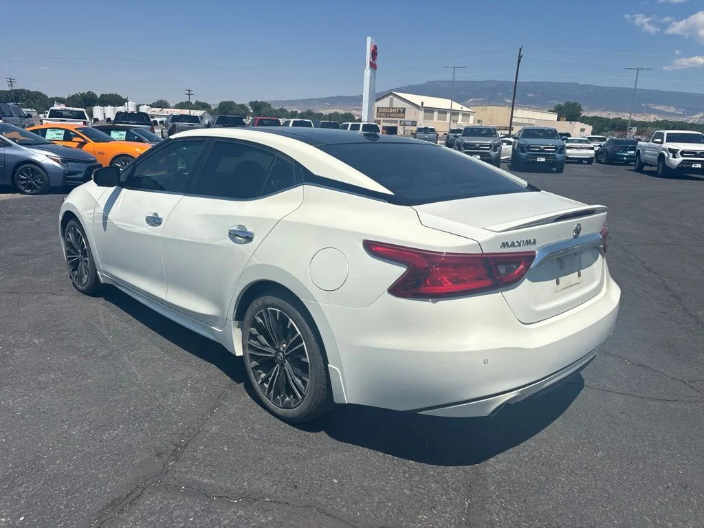Used 2016 White Nissan Platinum image 6