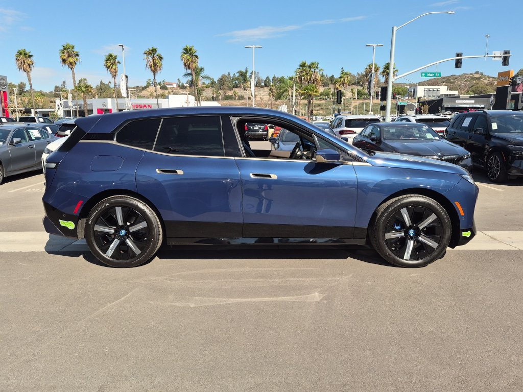 Used 2024 Blue BMW xDrive50 image 3