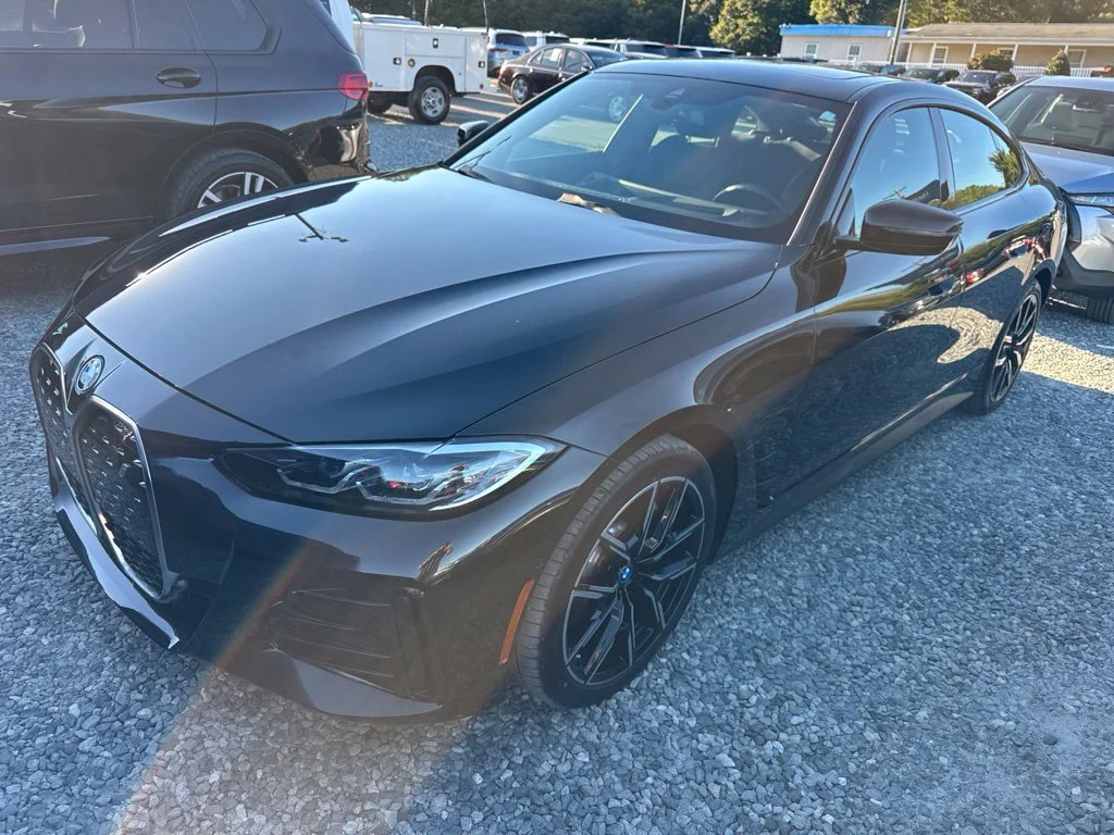 Used 2024 Black BMW eDrive40 image 1