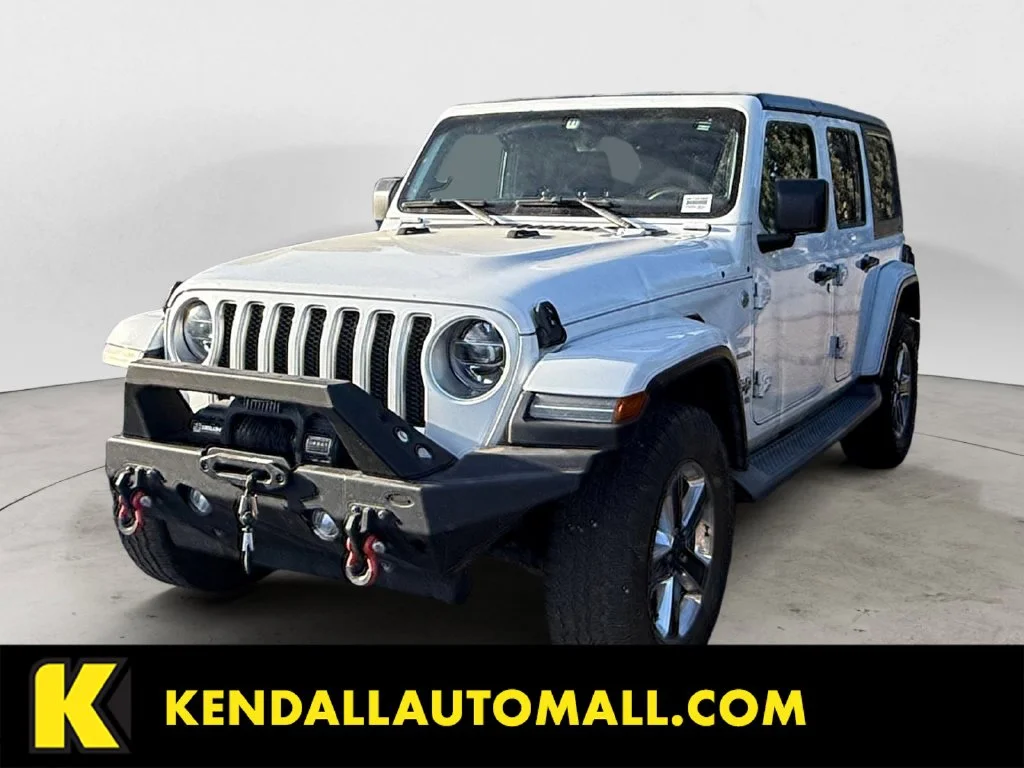 Used 2018 White Jeep Unlimited Sahara image 1