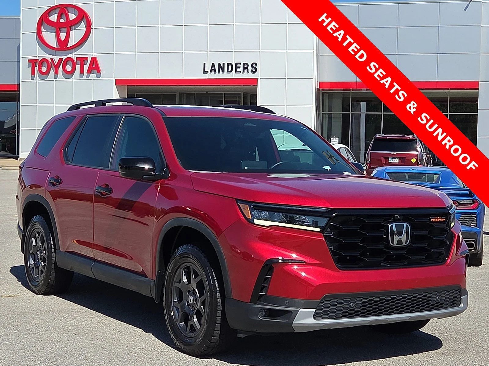 Used 2024 Radiant Red Metallic II Honda TrailSport image 1