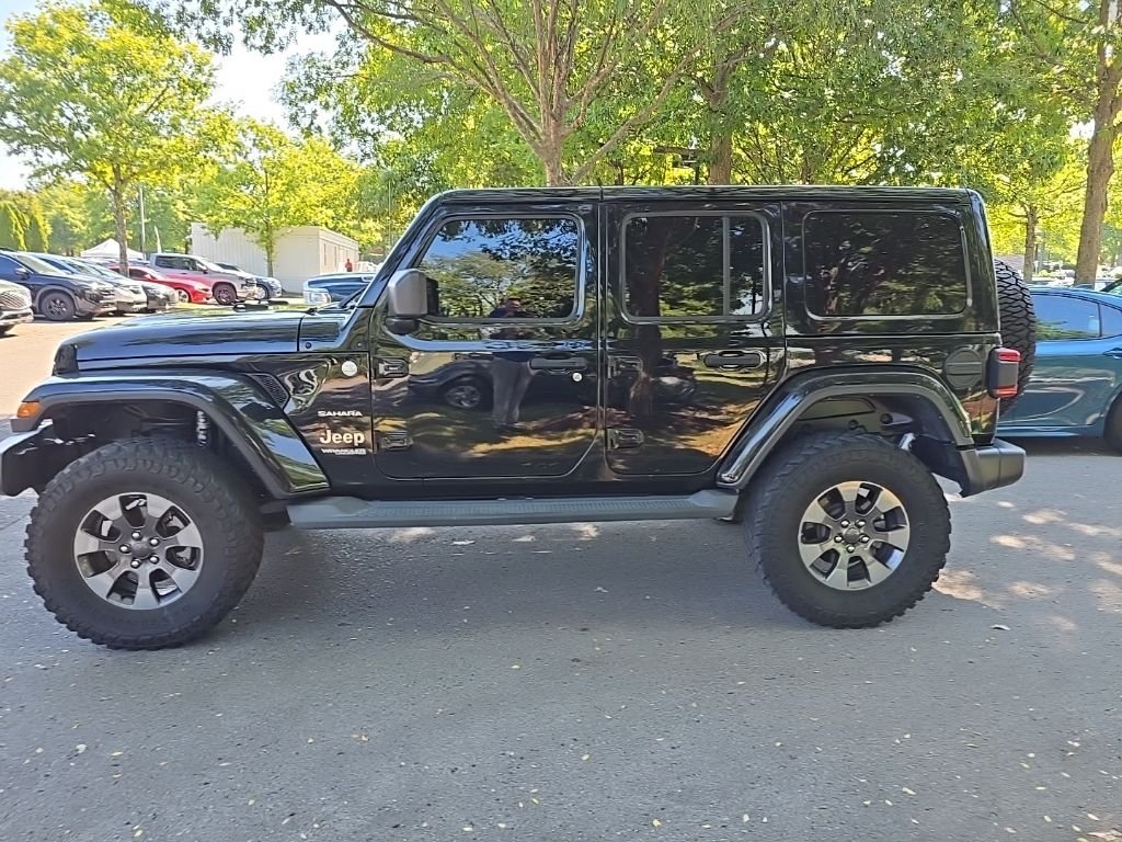 Used 2018 Black Jeep Unlimited Sahara image 5