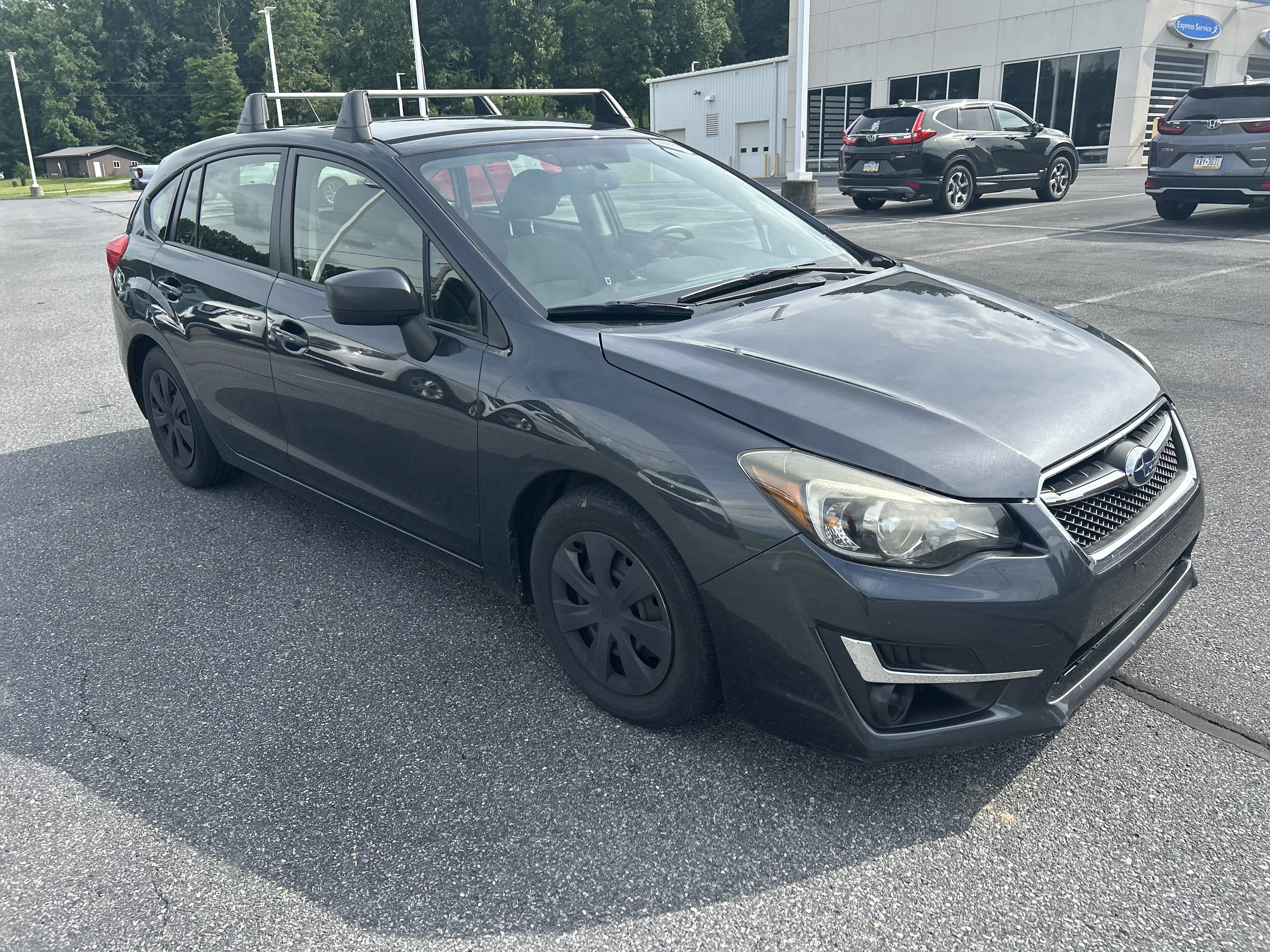 Used 2015 Dark Gray Metallic Subaru 2.0i image 1