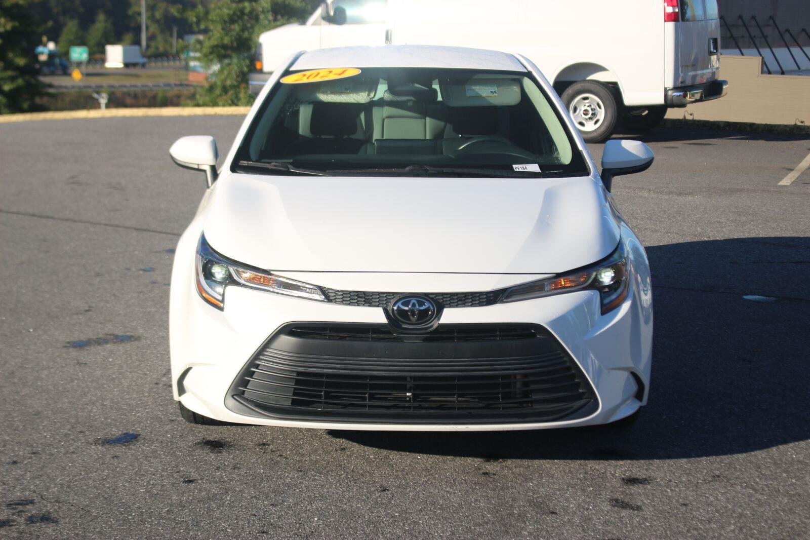 Used 2024 White Toyota LE image 2