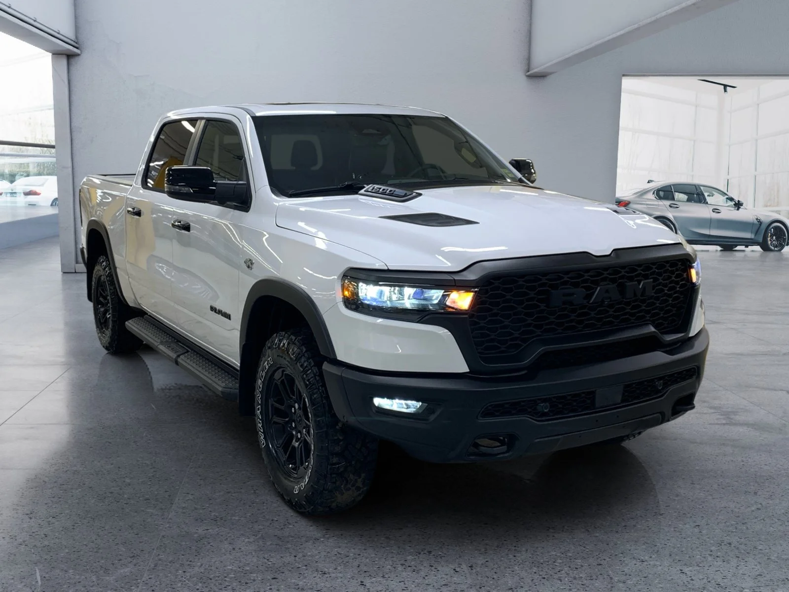 New 2026 Bright White Ram Rebel image 7