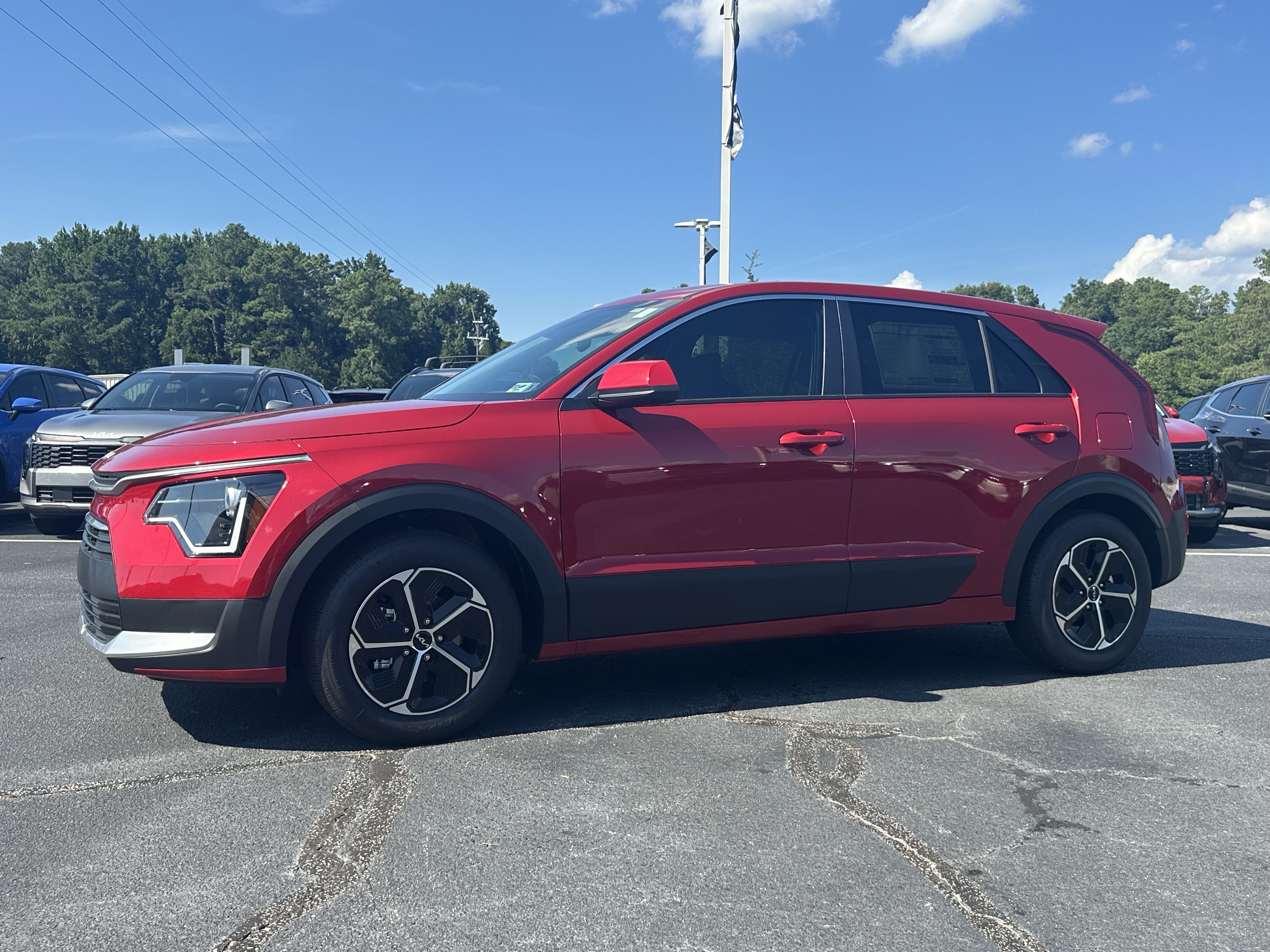New 2026 Runway Red Kia LX image 4
