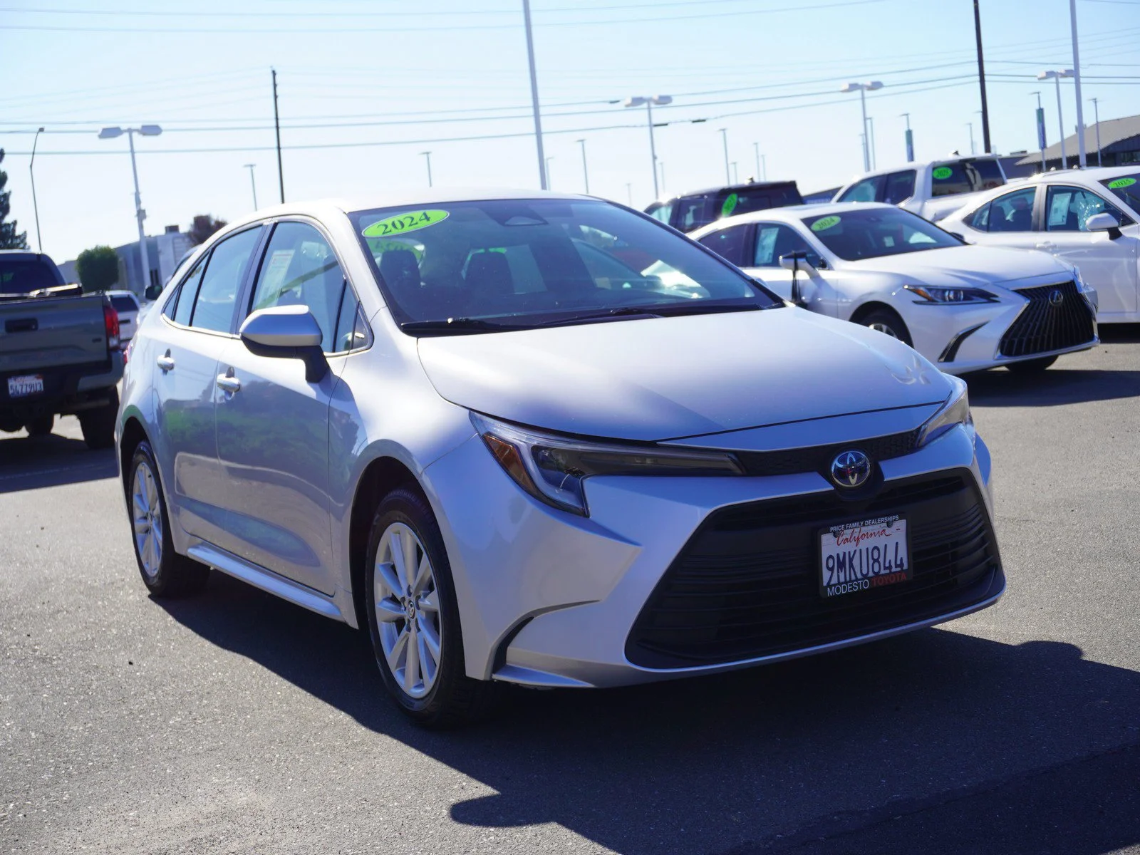 Used 2024 Classic Silver Toyota Hybrid XLE image 1