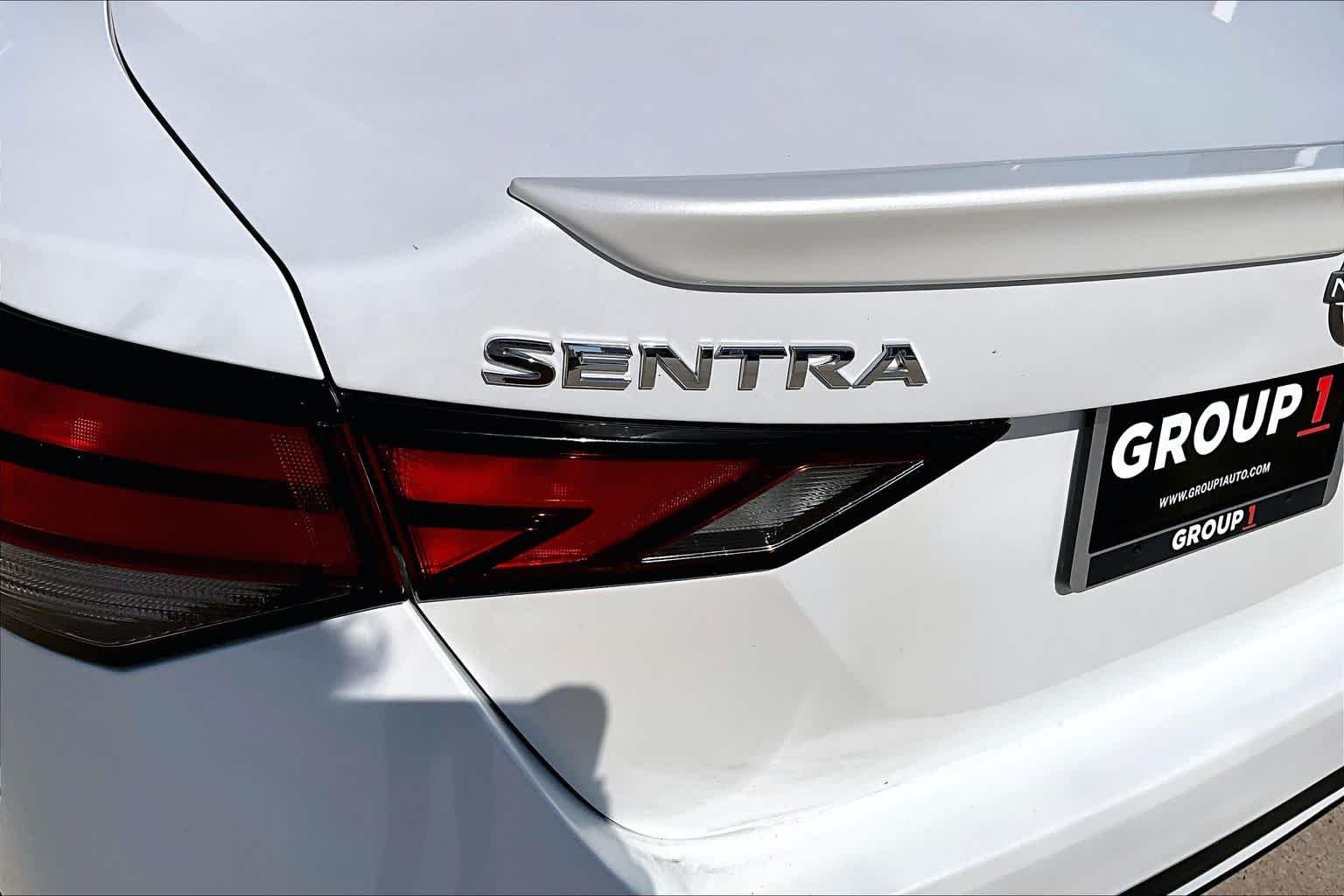 Used 2024 Aspen White Tricoat/Super Black Nissan SR image 22