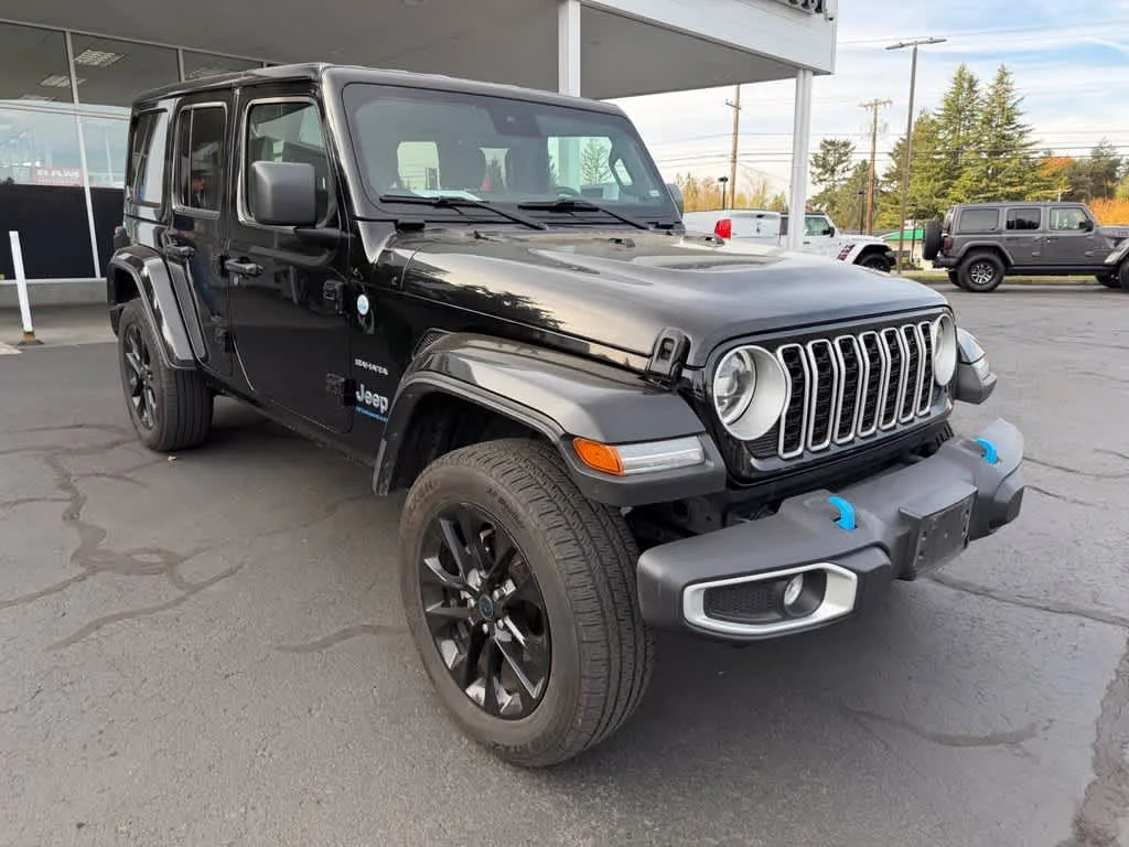 Used 2024 Black Jeep Sahara image 1