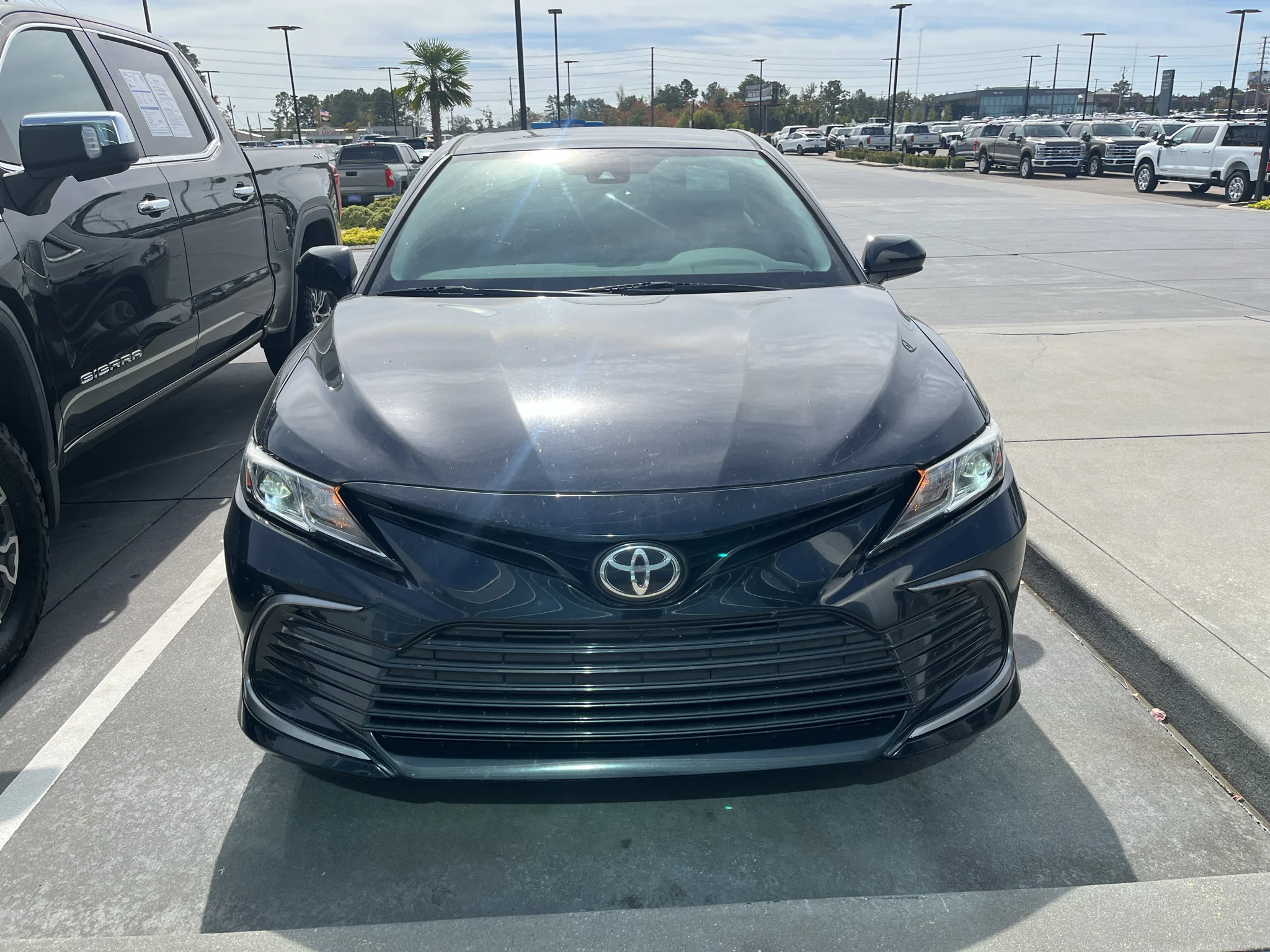 Used 2021 Midnight Black Metallic Toyota LE image 3