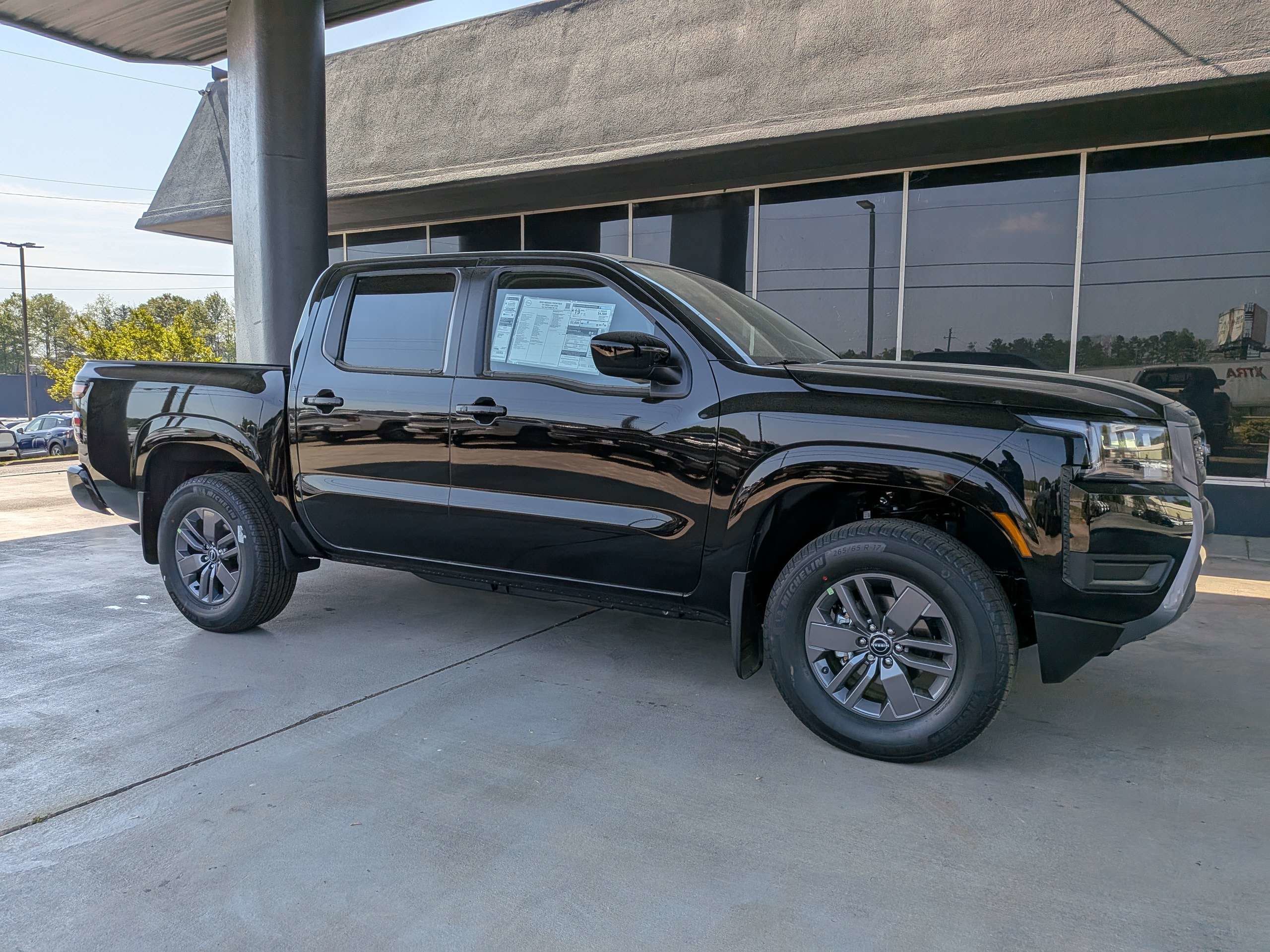 New 2026 Super Black Nissan Crew Cab SV image 1