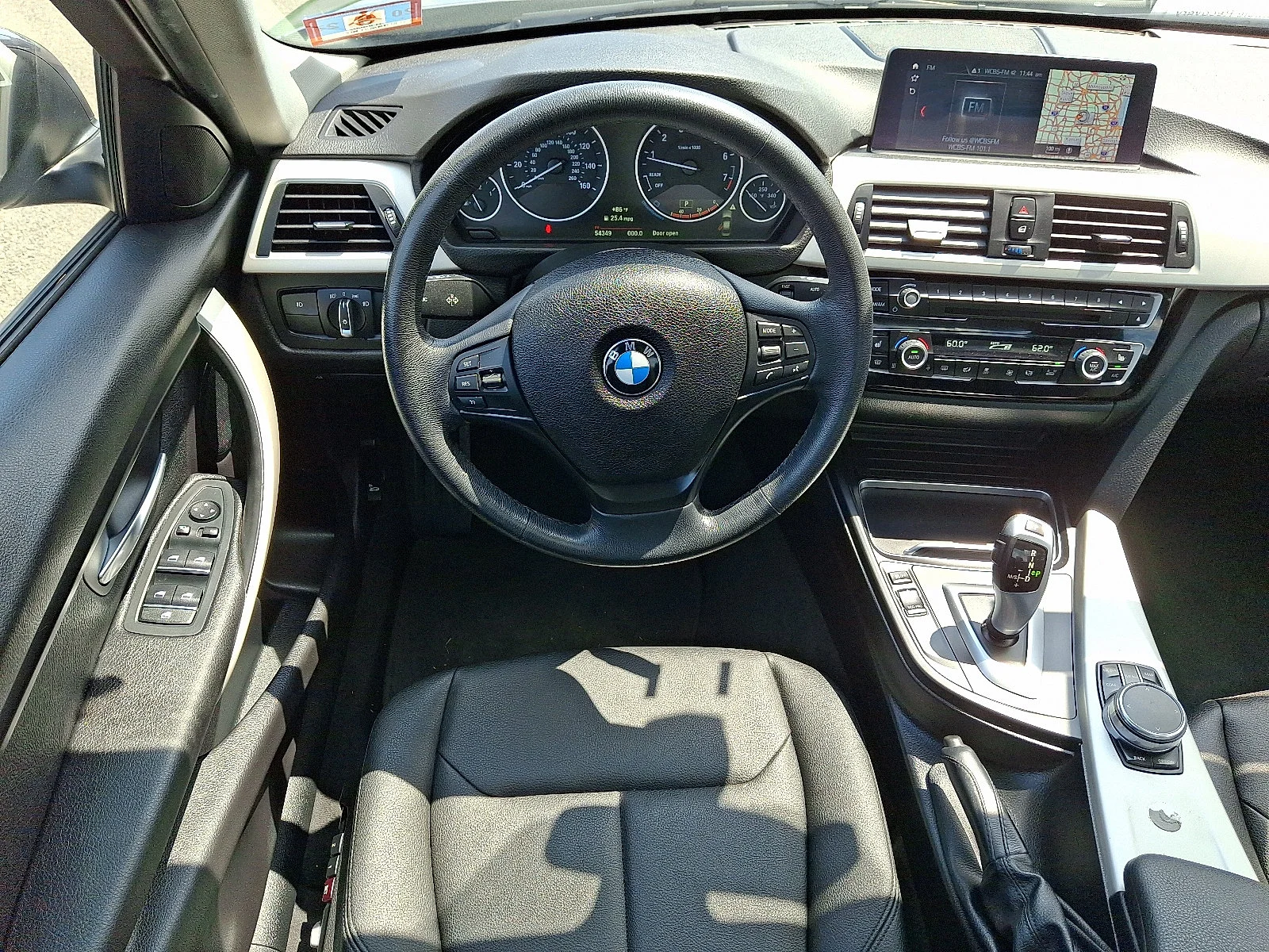 Used 2018 Mineral Gray Metallic BMW 320i xDrive image 12