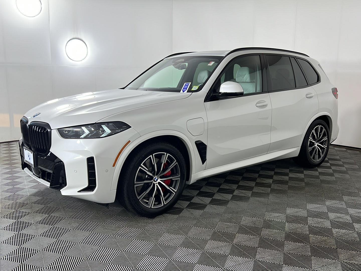 Used 2026 Mineral White Metallic BMW xDrive50e image 12