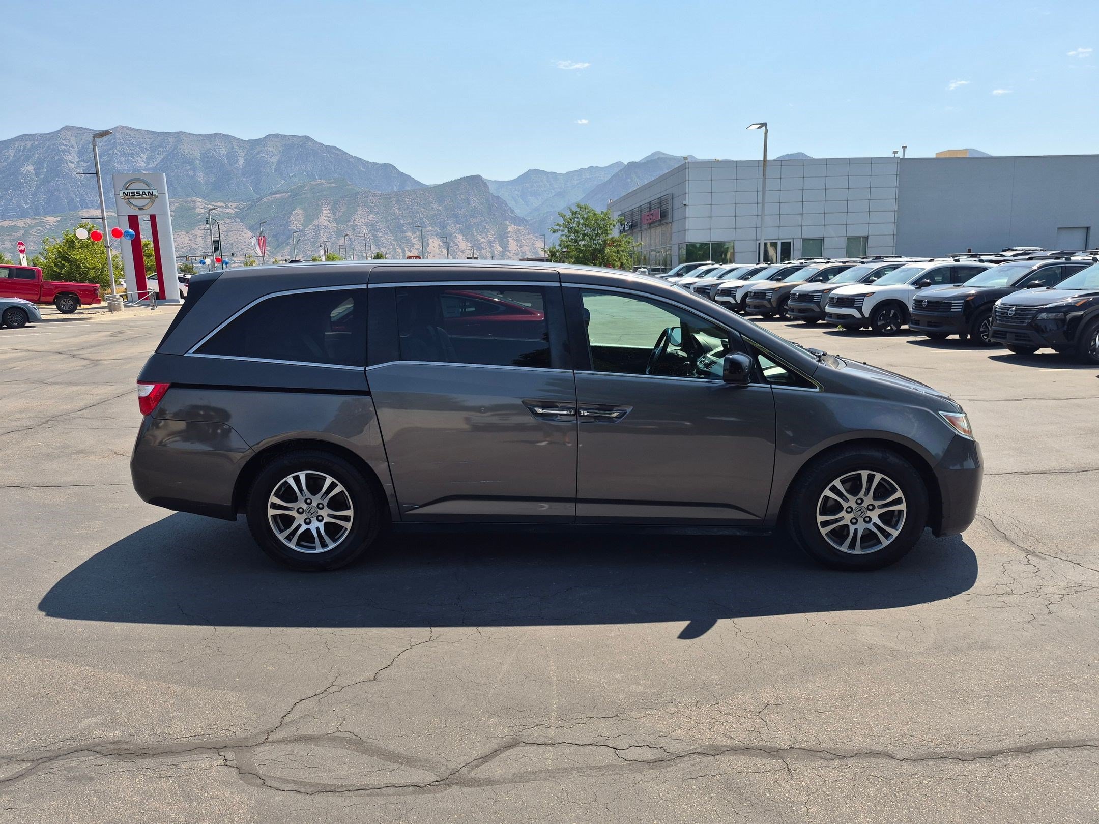 Used 2011 Honda Odyssey EX-L with VIN 5FNRL5H66BB057666 for sale in Orem, UT