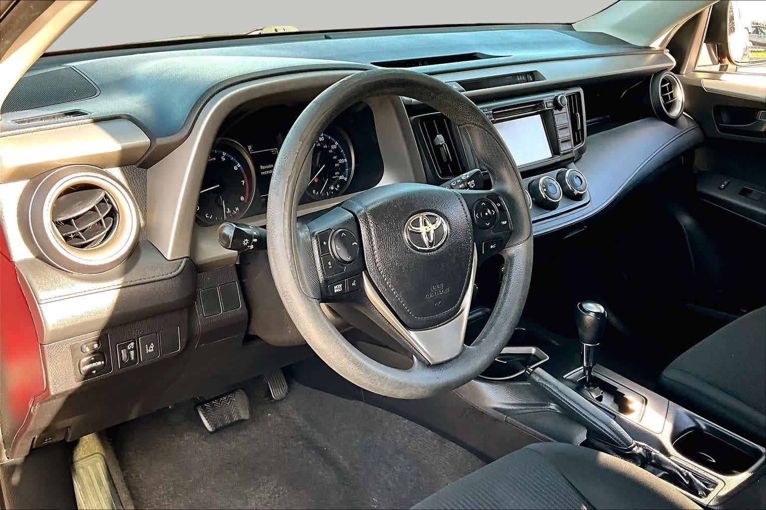 Used 2017 Barcelona Red Metallic Toyota LE image 18